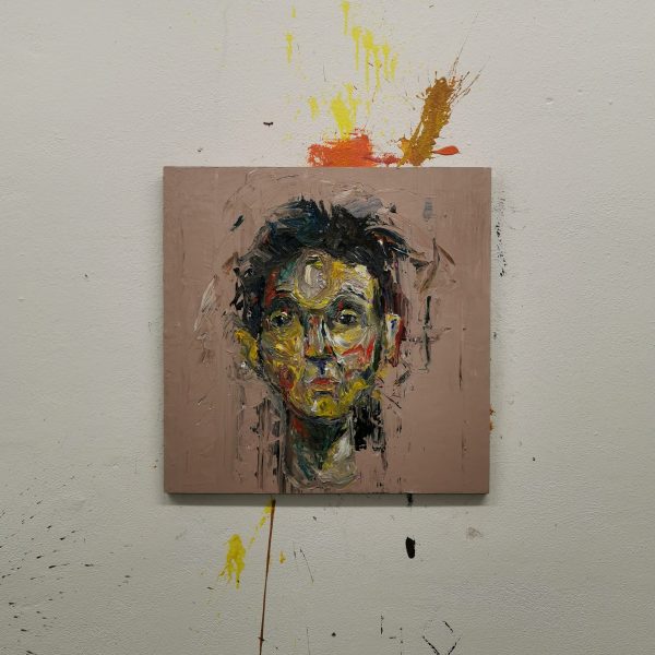 Obraz s názvem ”Úmysly” je namalovaný akrylovými barvami na dřevěnou desku. Motiv obrazu je mužský portrét.